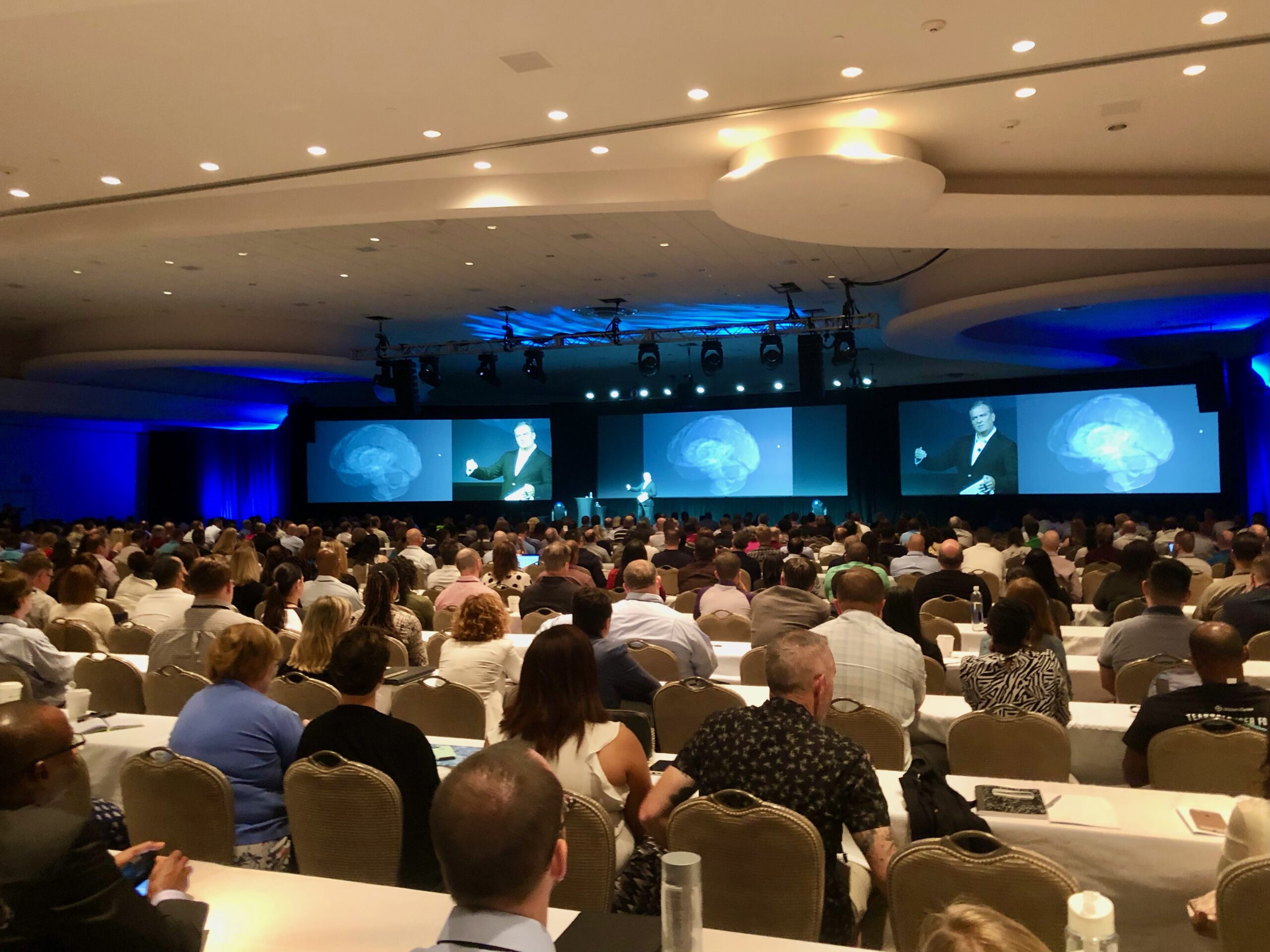 Toby Groves delivering a keynote on stage